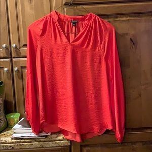 A red long sleeved shirt